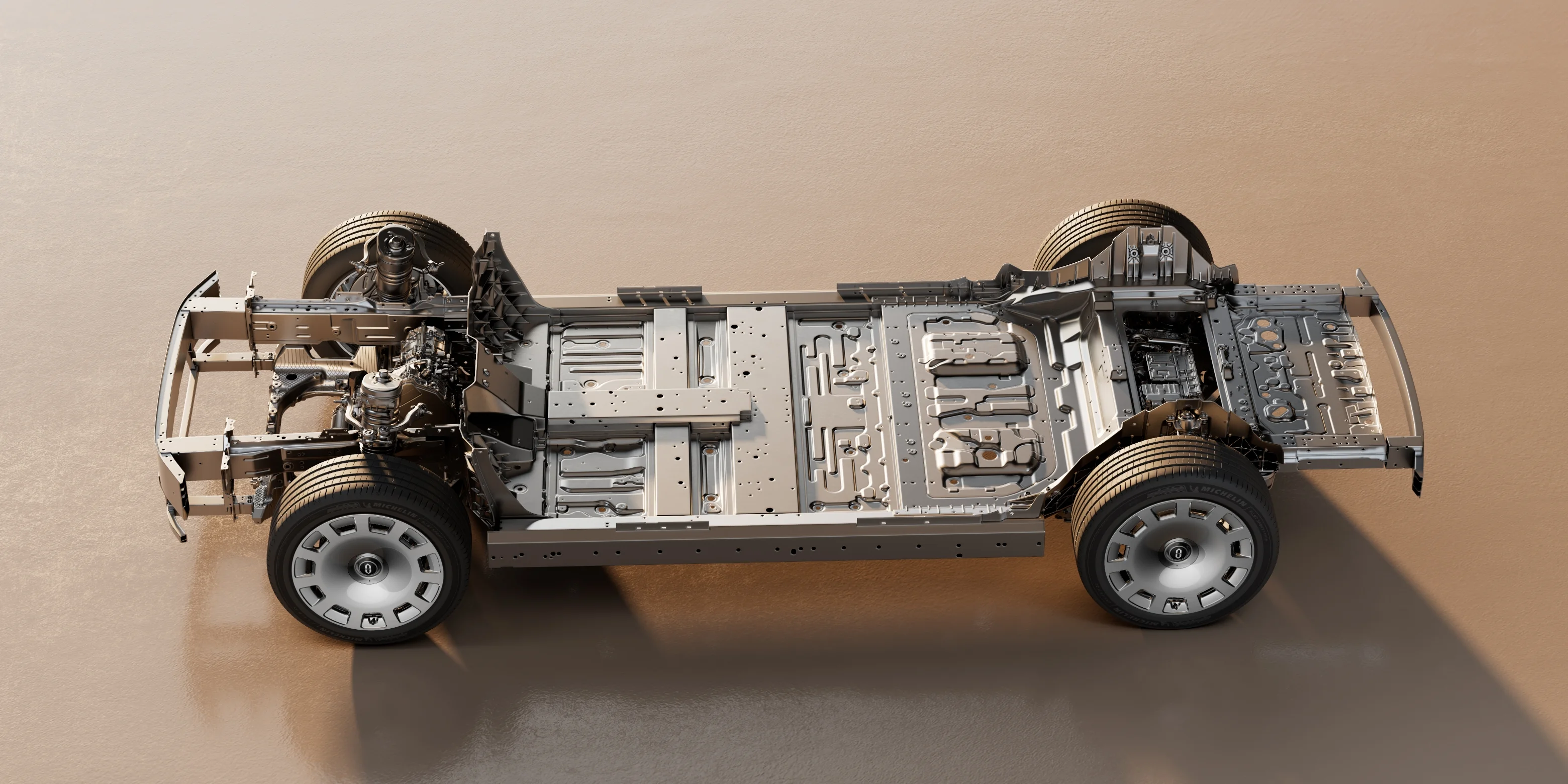 Front long double wishbones with four ball joints, rear five-link suspension with a six-bushing subframe, closed dual-chamber air springs and dual-valve variable dampers balance handling and comfort.